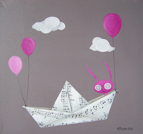 le lapin dans un bateau en papier